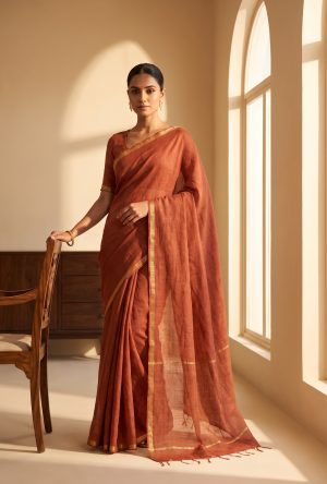 New Rust Handwoven Linen Saree with Zari Border